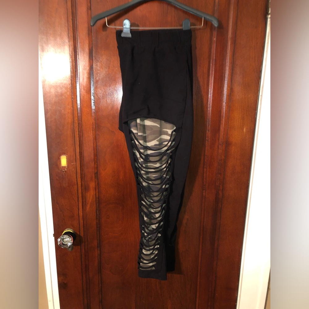 Black leggings with distressing and camo print (torrid size 5 )